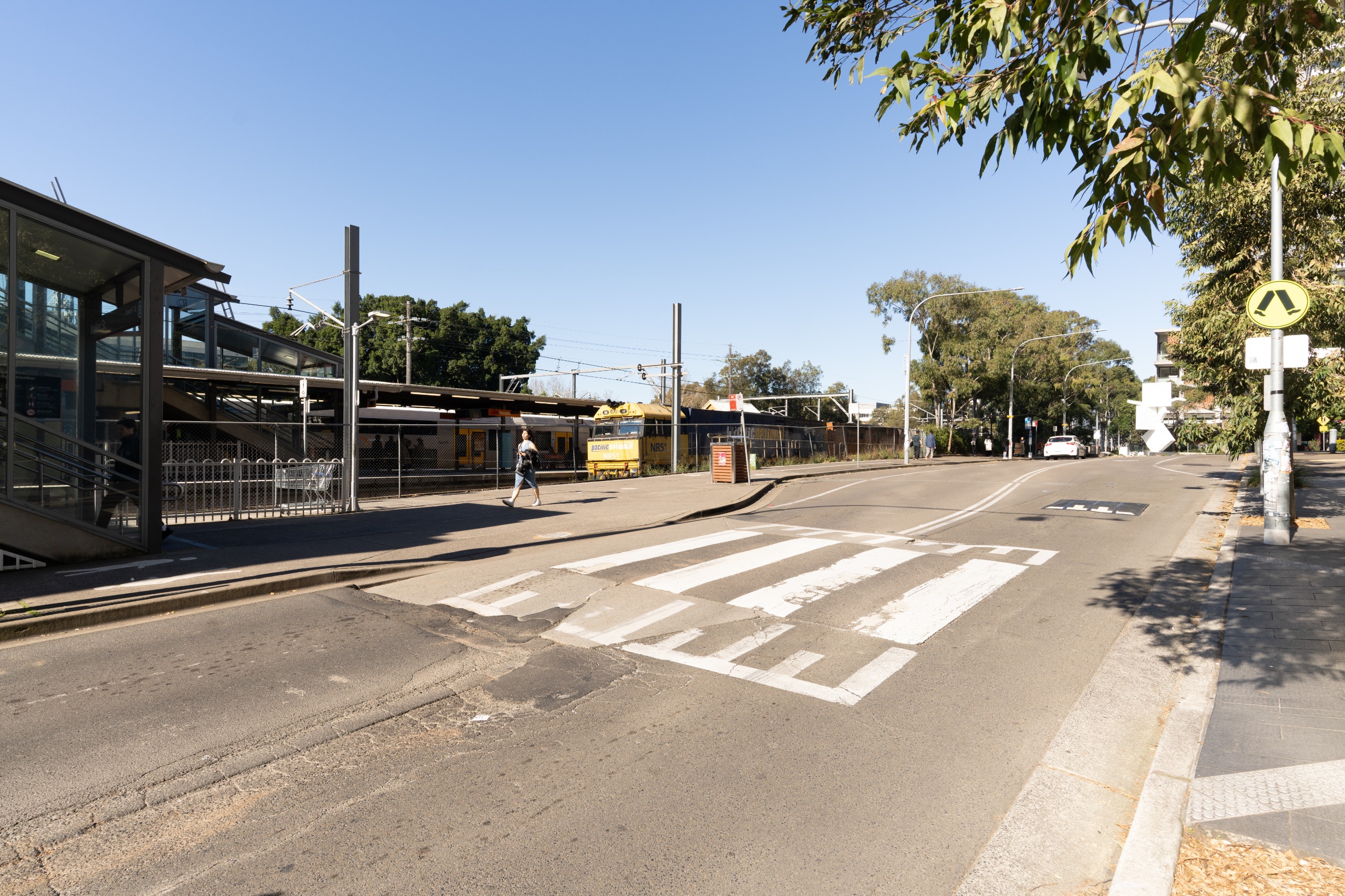 Before: Pedestrian crossing outside Rhodes train station