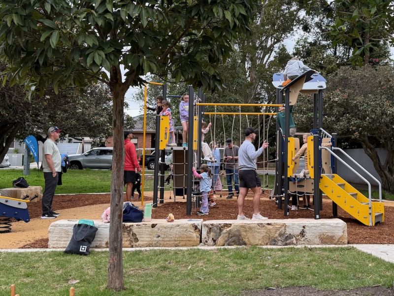 Children playing on a playground structure